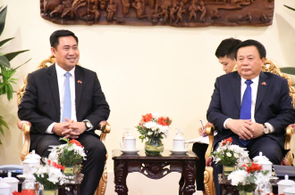 Champasak Delegation Meets Head of Ho Chi Minh National Academy of Politics